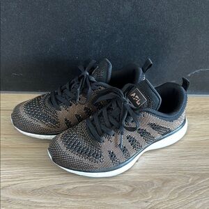 APL Women’s Black and Rose Gold Techloom Pro Knit Athletic Shoes